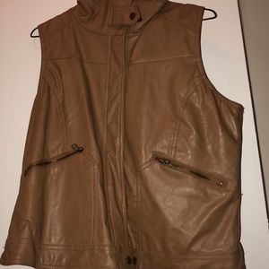Cream colored leather vest